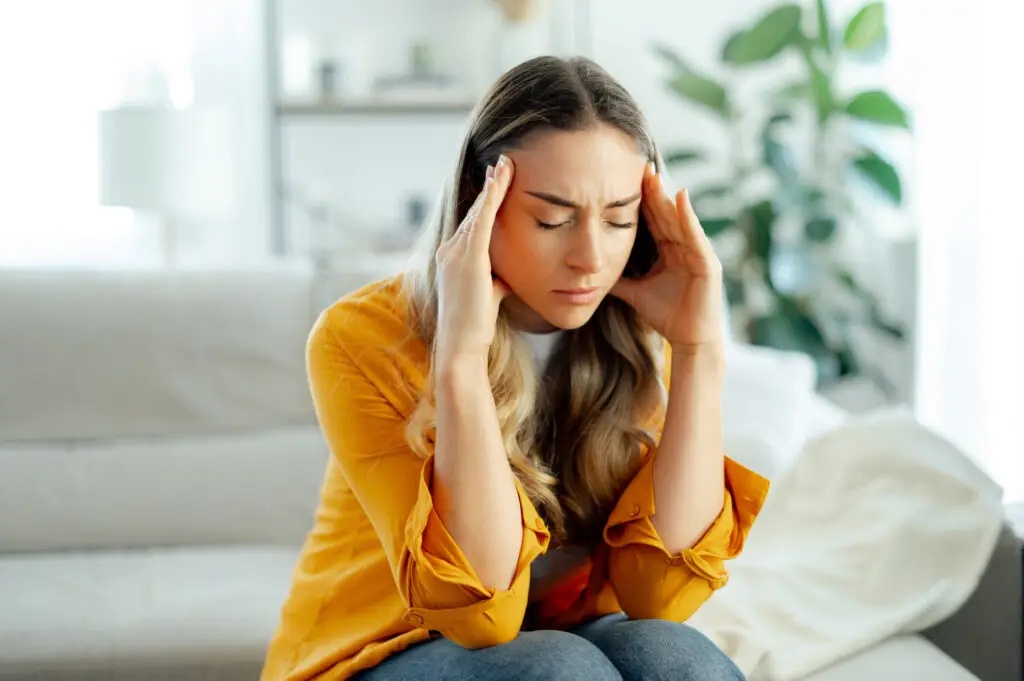 woman with severe headache pain